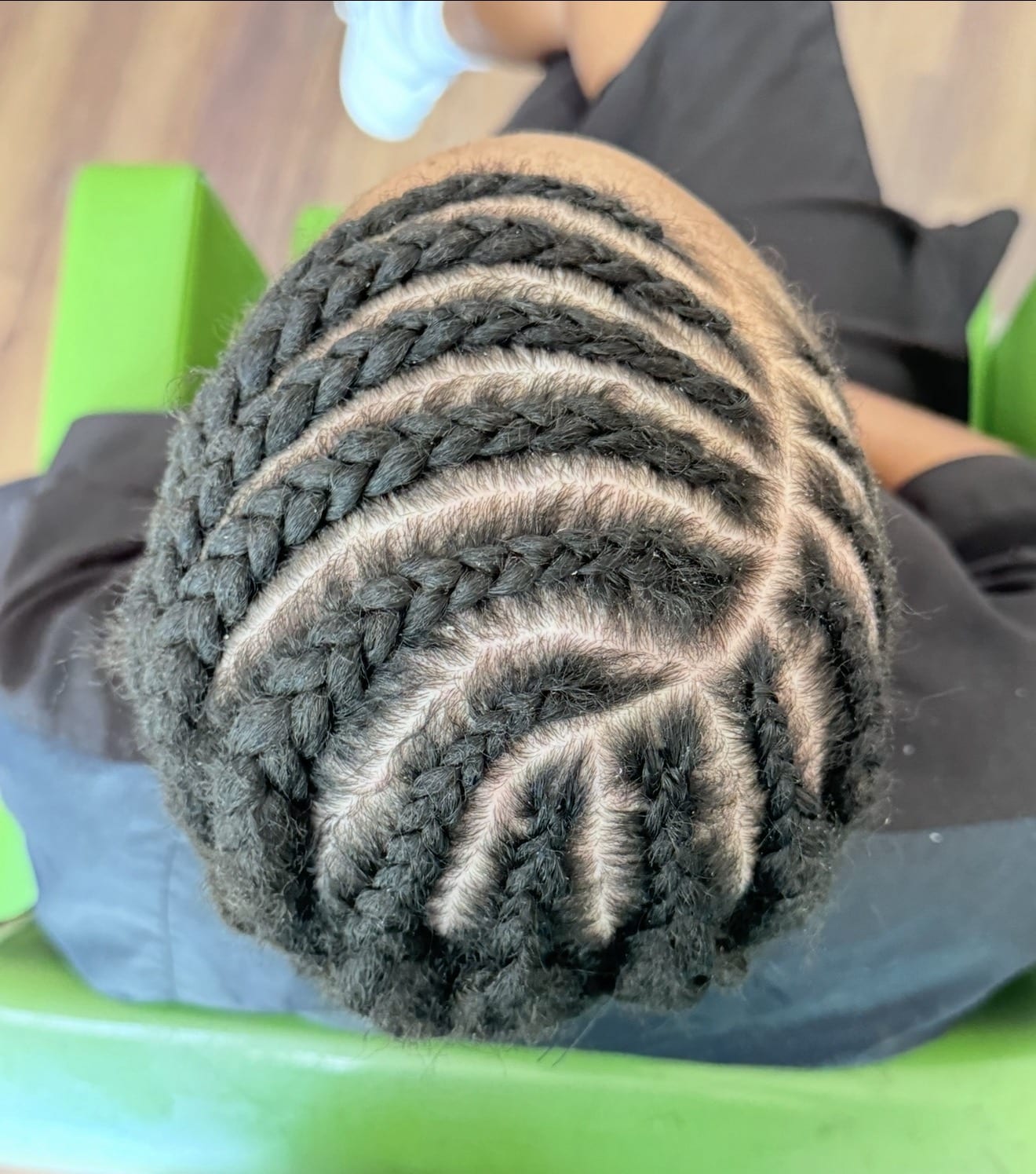 Sew in extension weft attached to a braided foundation